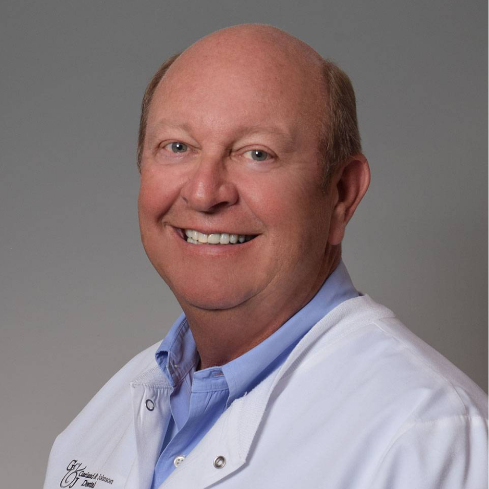 Dr. ROBERT GARLAND